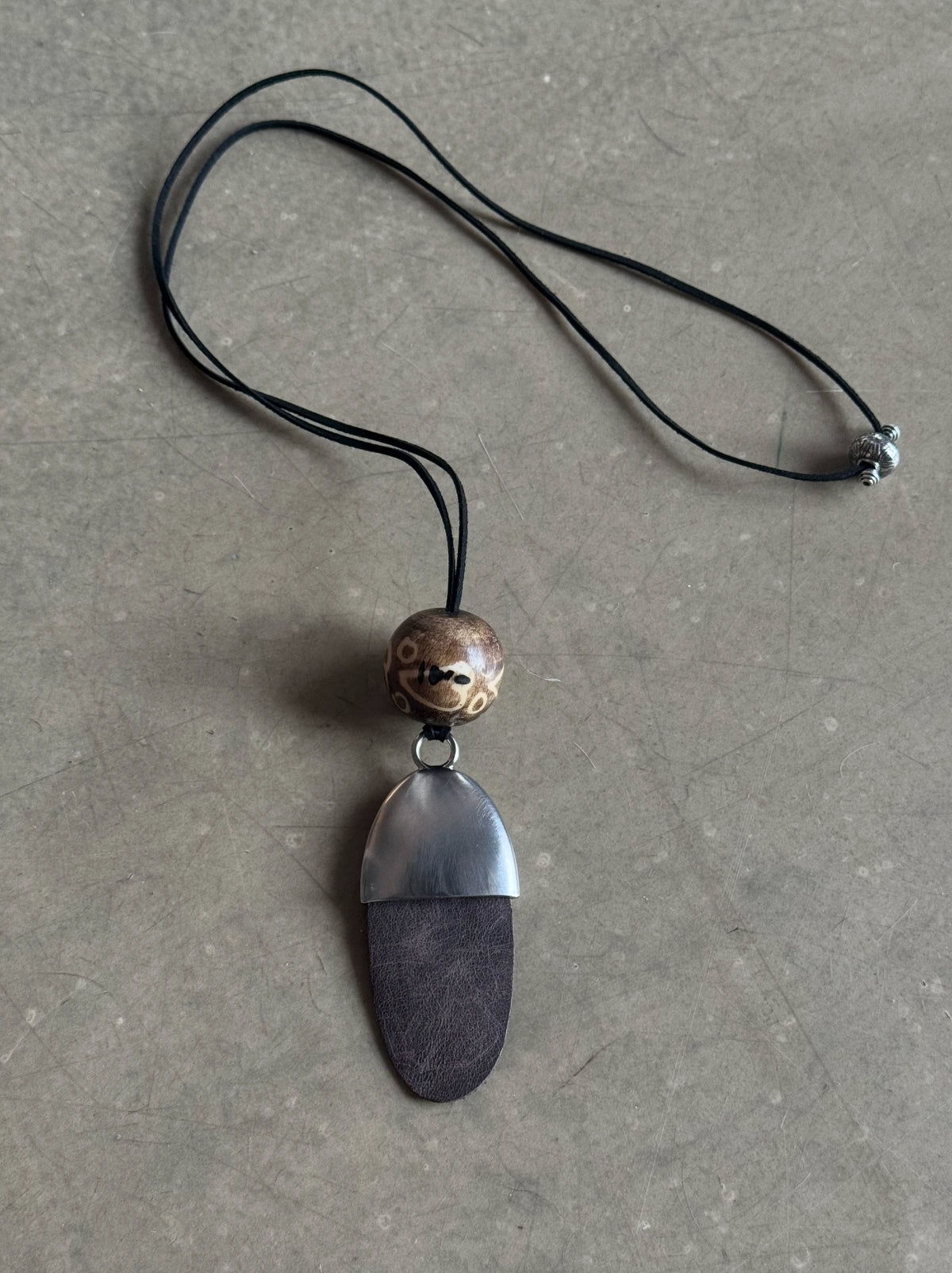 DROP OF ⬤ EARTH TOTEM (horn unique sample) — view 5
